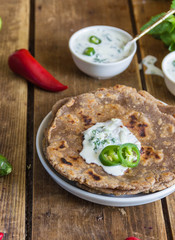 Tortilla  chapati with sauce Raita, chilli. Indian cuisine