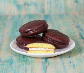 chocolate Sponge sandwich pie on wood table