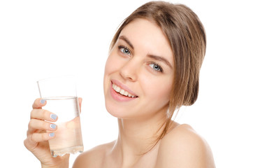 portrait of attractive  caucasian smiling woman isolated on white studio shot drinking water