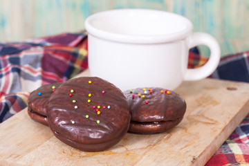 chocolate Sponge sandwich pie on wood table