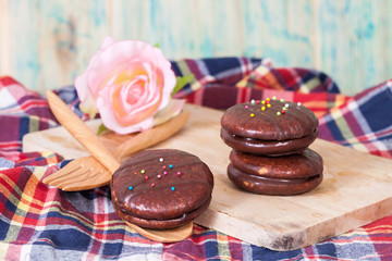 chocolate Sponge sandwich pie on wood table