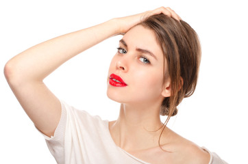 Naklejka premium Beauty model girl tired and holding head isolated over white