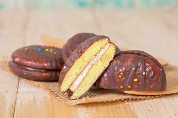 chocolate Sponge sandwich pie on wood table