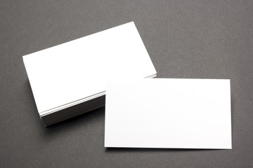 Business card blank over office table. Corporate stationery branding mock-up