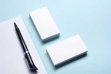 Business card blank over office table. Corporate stationery branding mock-up