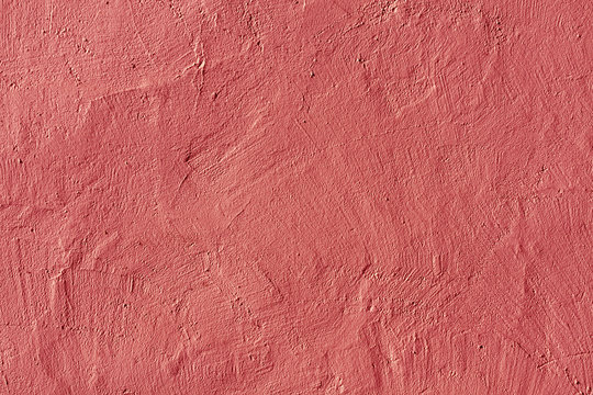 Abstract pink plaster wall texture.