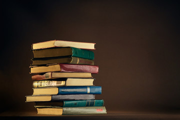 Stack of Used Old Books in the School Library