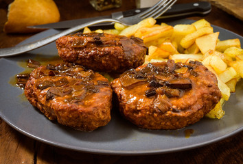 Russian steaks with salsa and chips
