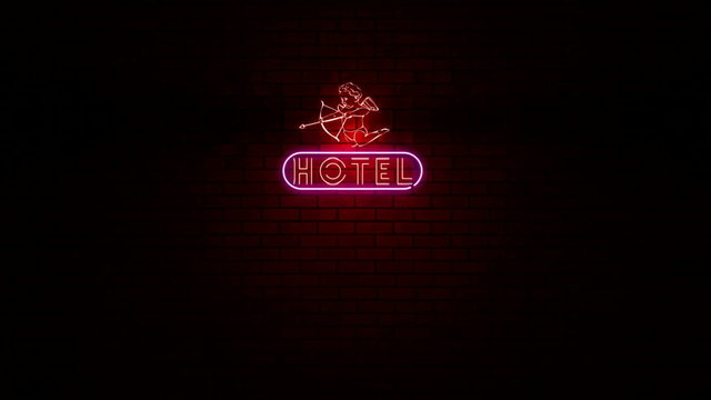 Animation of word hotel at neon light sign with a cupid shape in urban wall with red light