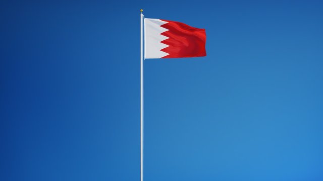 Bahrain flag waving in slow motion against clean blue sky, seamlessly looped, long shot, isolated on alpha channel with black and white luminance matte, perfect for film, news, digital composition