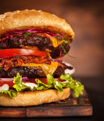 Fresh home-made hamburger served on wood