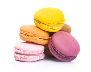 Stack of colorful macarons isolated on white background