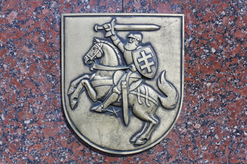 The bronze coat of arms of the republic Lithuania