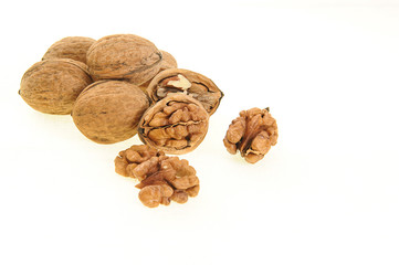Walnut and walnut kernel isolated on the white background. 