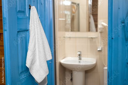 Towel Hanging On The Bathroom Door Stock Photo And Royalty Free Towel Hanging On The Bathroom Door