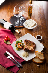 gourmet dinner grilled beef fillet on wooden table