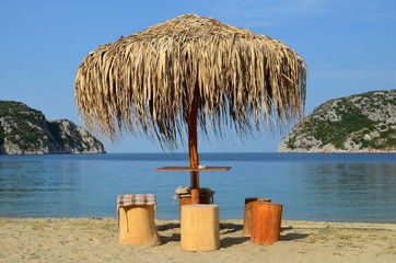 Sun umbrella and stump seats