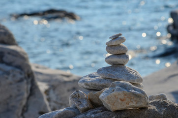 Fototapeta na wymiar Zen stones on rocky beach