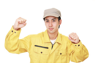 ガッツポーズの作業員