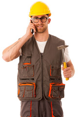 Young worker wtih protective dress and yellow helmet holding ham