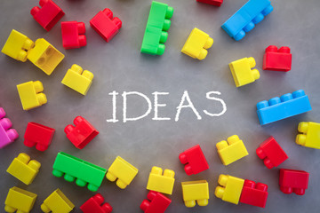 Fototapeta premium ideas concept word with plastic block