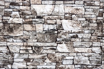 Wall built of natural stone