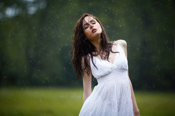 beautiful girl under rain