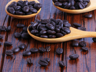 Coffee beans on the wooden floor