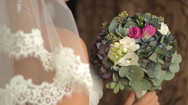 Bride holding her wedding bouquet