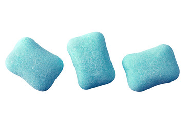 Blue chewing gum piece on white