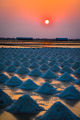 sunset over the salt field in thailand