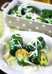 Gourmet chard roll with potatoes, peas, carrots and goat cheese.