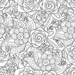 Fototapeta na wymiar Doodle flowers seamless pattern. Zentangle style flowers and leaves background. Black and white hand drawn herbal pattern.