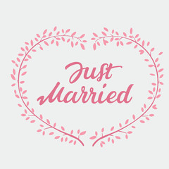 Lettering of text Just Married and pink wreath 