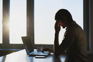 Tired businessman in the office