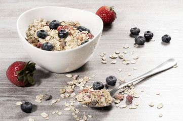 diet weight loss breakfast, healthy food with muesli , strawberry and blueberry