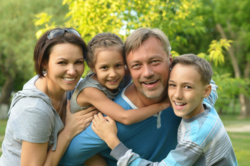 Family resting in  summer park