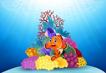 Fototapeta na wymiar Happy clown fish and beautiful underwater world with corals