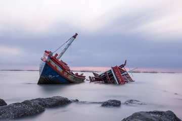 Shipwreck on a Beach with cloudy Sky, Thailand