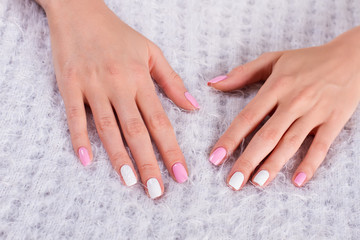 Female hands on a soft background.