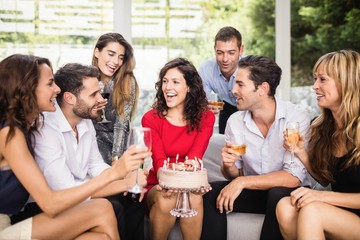 Woman celebrating her birthday with friends