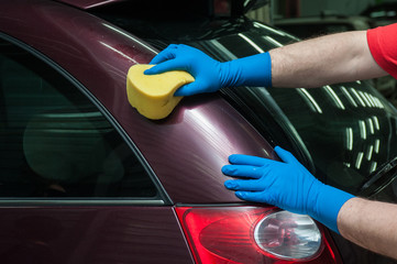 washing car with sponge