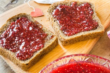  raspberry jam and a slice of black bread