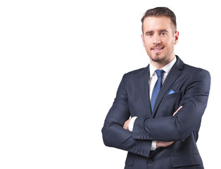 Portrait of a handsome businessman standing with arms crossed, i