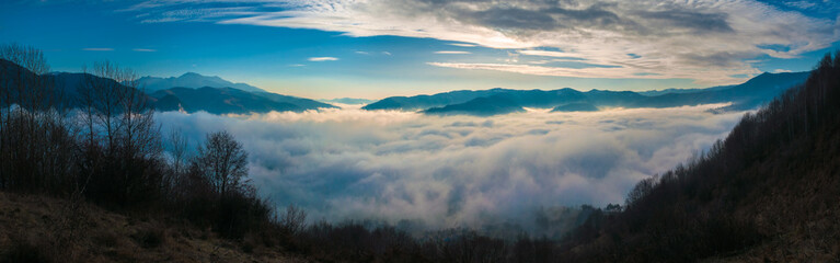 Rural landscape with low clouds panorama