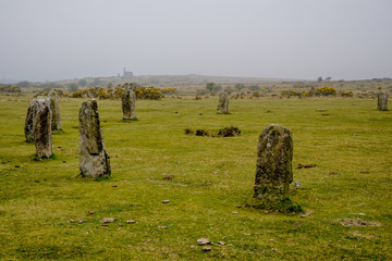 celtic stone circles in the foggy moorland 
Minions, Cornwall, England, United Kingdom