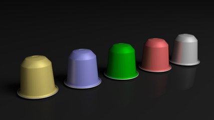 Colorful coffee capsules, isolated on black background.
