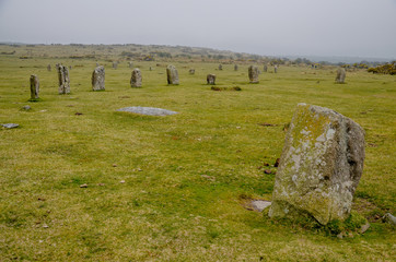 celtic stone circles in the foggy moorland 
Minions, Cornwall, England, United Kingdom