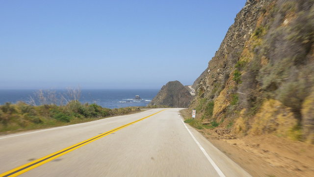 Vehicle point-of-view on Pacific Coast Highway (aka Cabrillo Highway or California Highway 1) in the Big Sur area of Central California