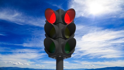 Traffic lights on  red, with blue sky background